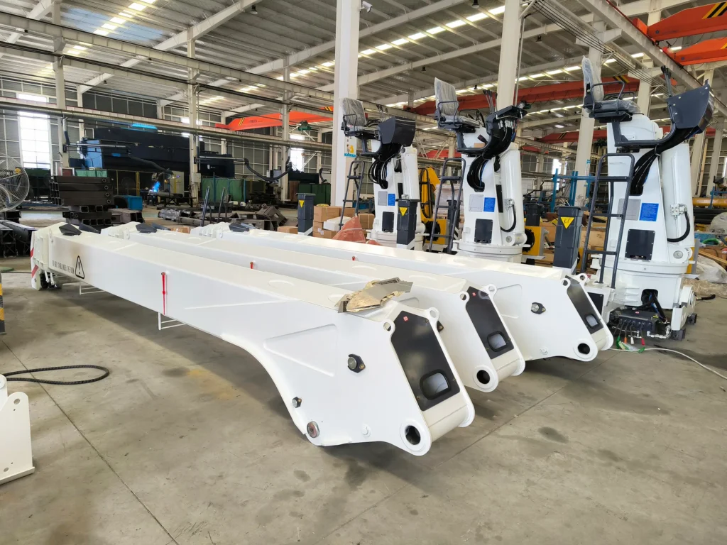 Newly manufactured SQS250A-4 crane units featuring hydraulic telescopic booms, part of a customer's order for truck mounted cranes.
