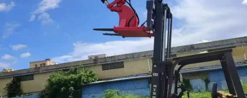 Customer's red ZORYLIFT forklift jib boom crane, a telescopic forklift crane attachment mounted on an orange Lonking forklift.